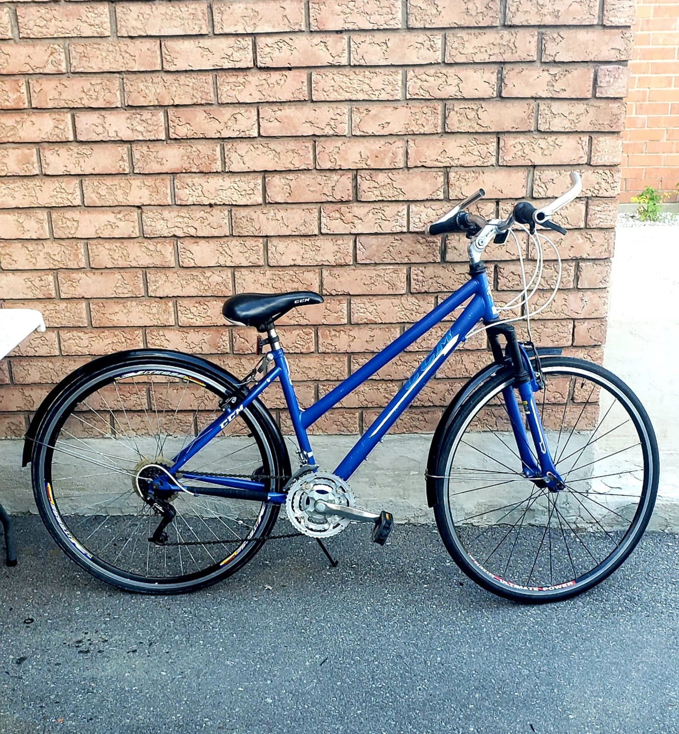 Blue CCM Hybrid Bike