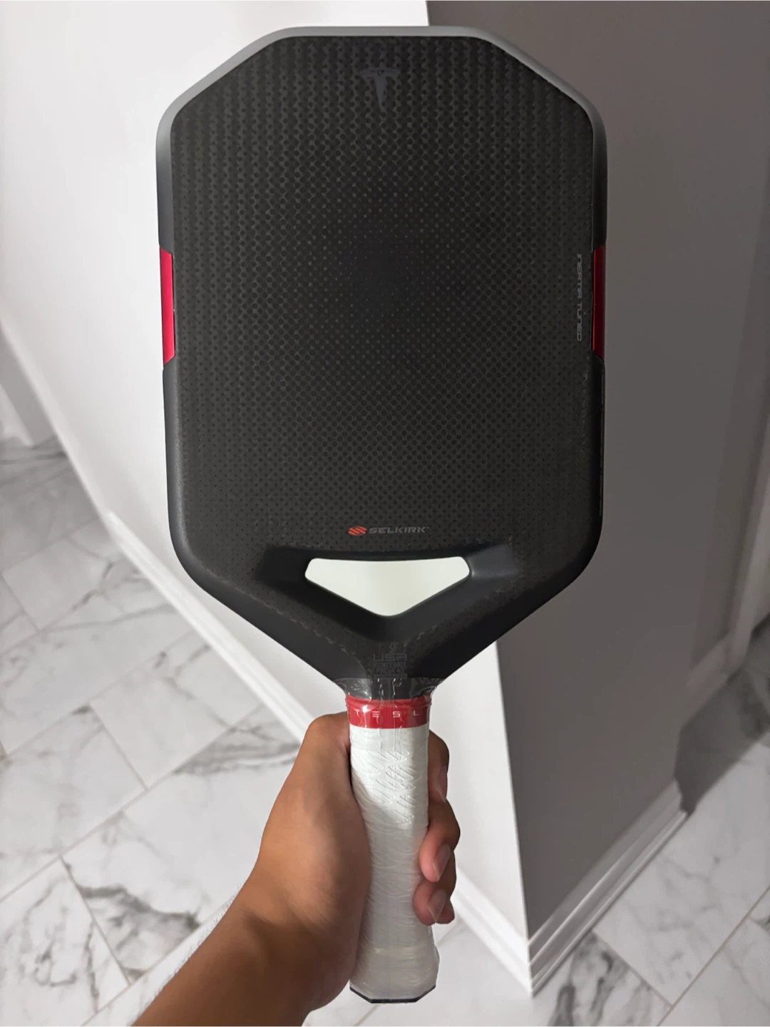 Tesla x Selkirk LABS pickleball paddle