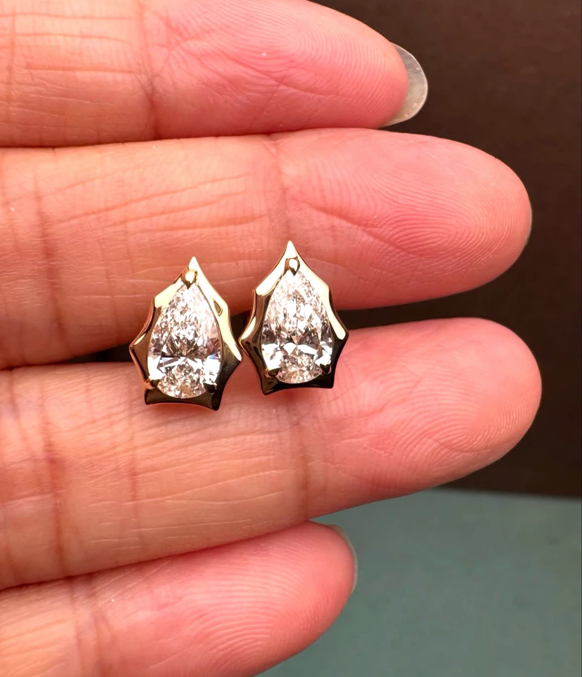 Pear Cut Diamond Stud Earrings in Gold