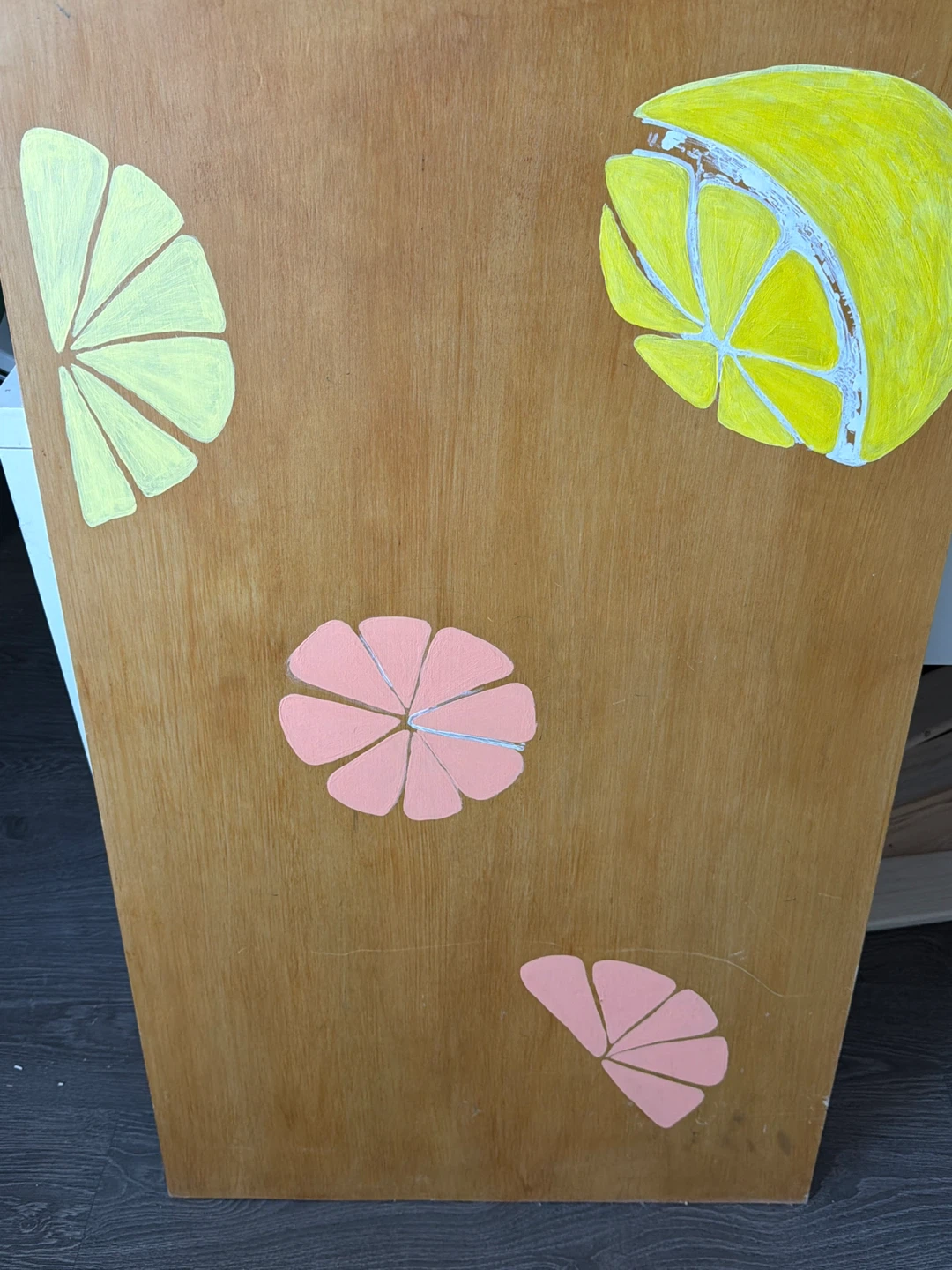 Wood panel with citrus fruit decals