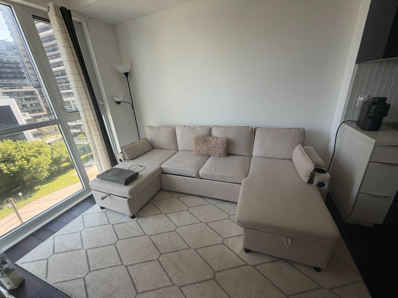 Beige Sectional Sofa with Storage and Cup Holders