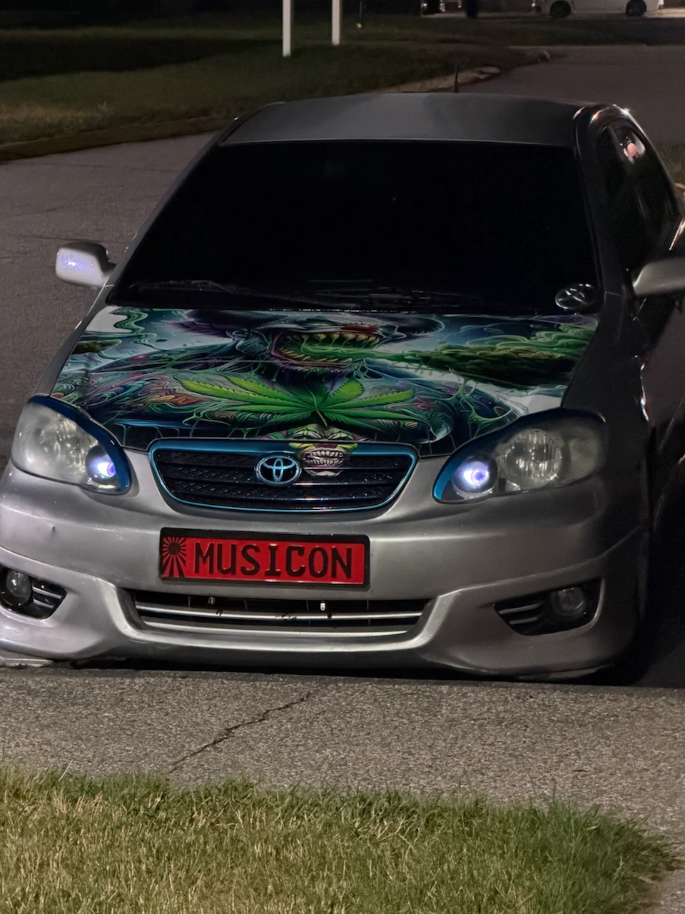 Custom Toyota Corolla with Unique Hood Graphic