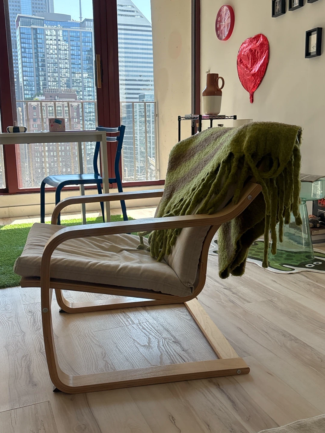 Modern Lounge Chair with Green Striped Throw Blanket - photo 2