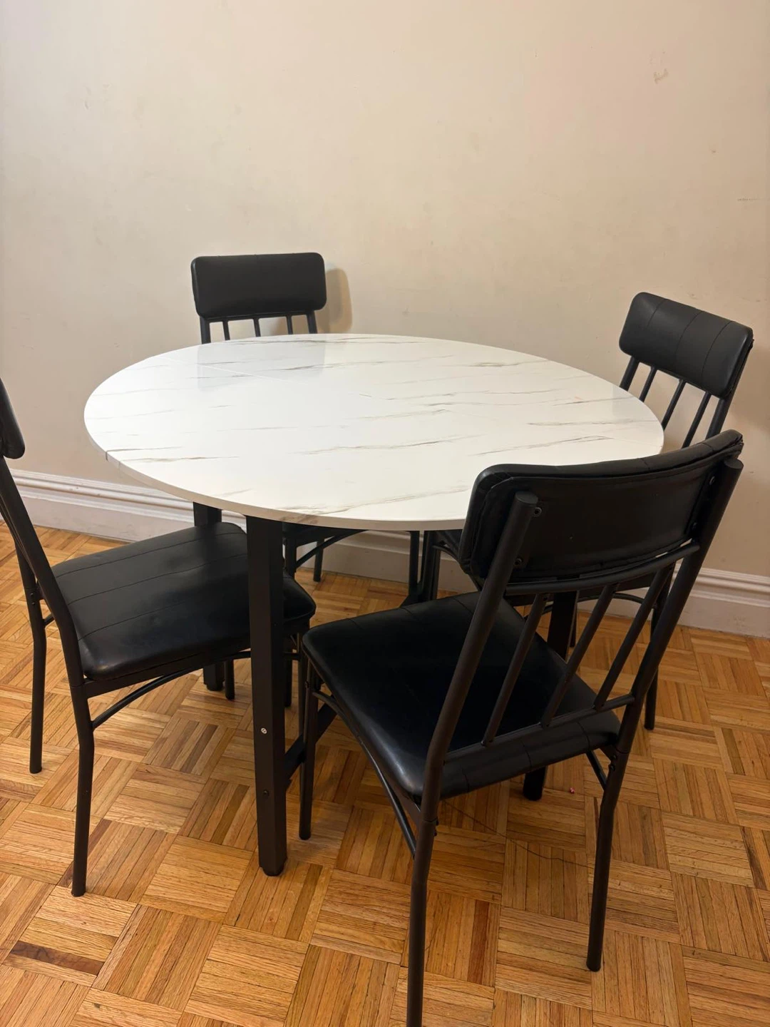 White Marble Dining Table with 4 Black Chairs