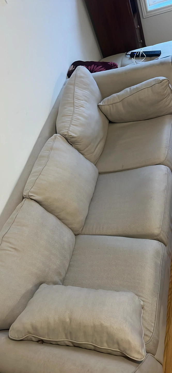 Beige Sectional Sofa with Pillows