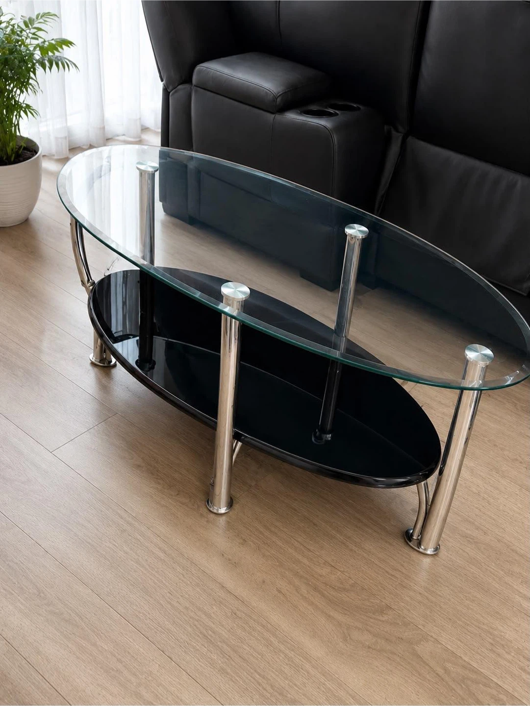 Oval Glass Coffee Table with Black Shelf