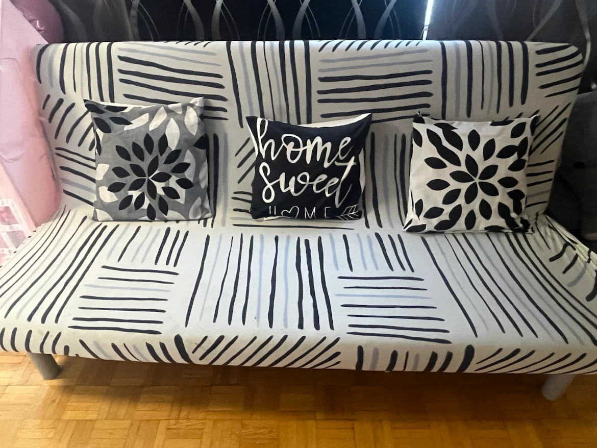 Futon (Sofa cum bed )with cover and 3 decorative pillows