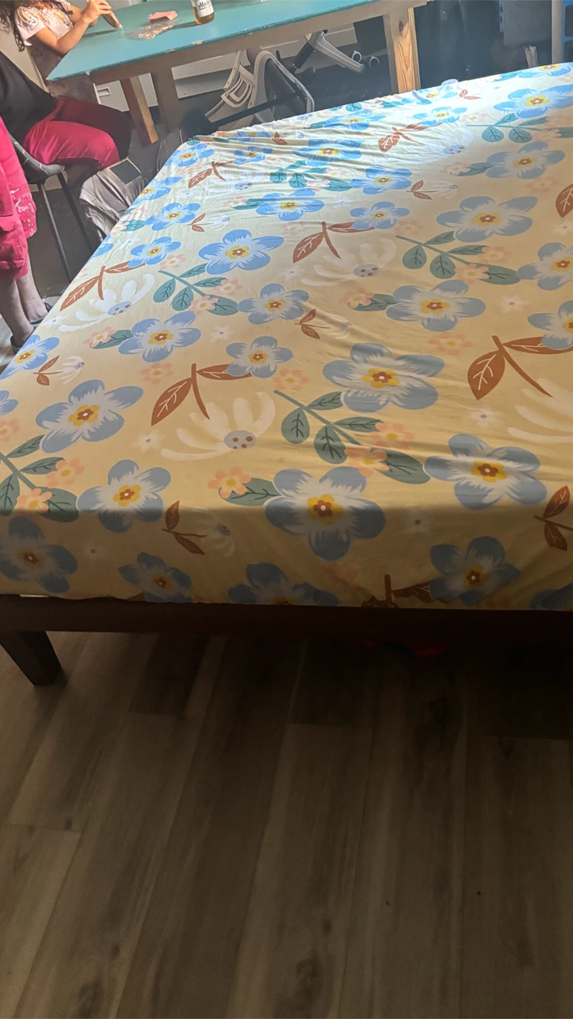 Queen Size Bed Frame with Floral Sheet