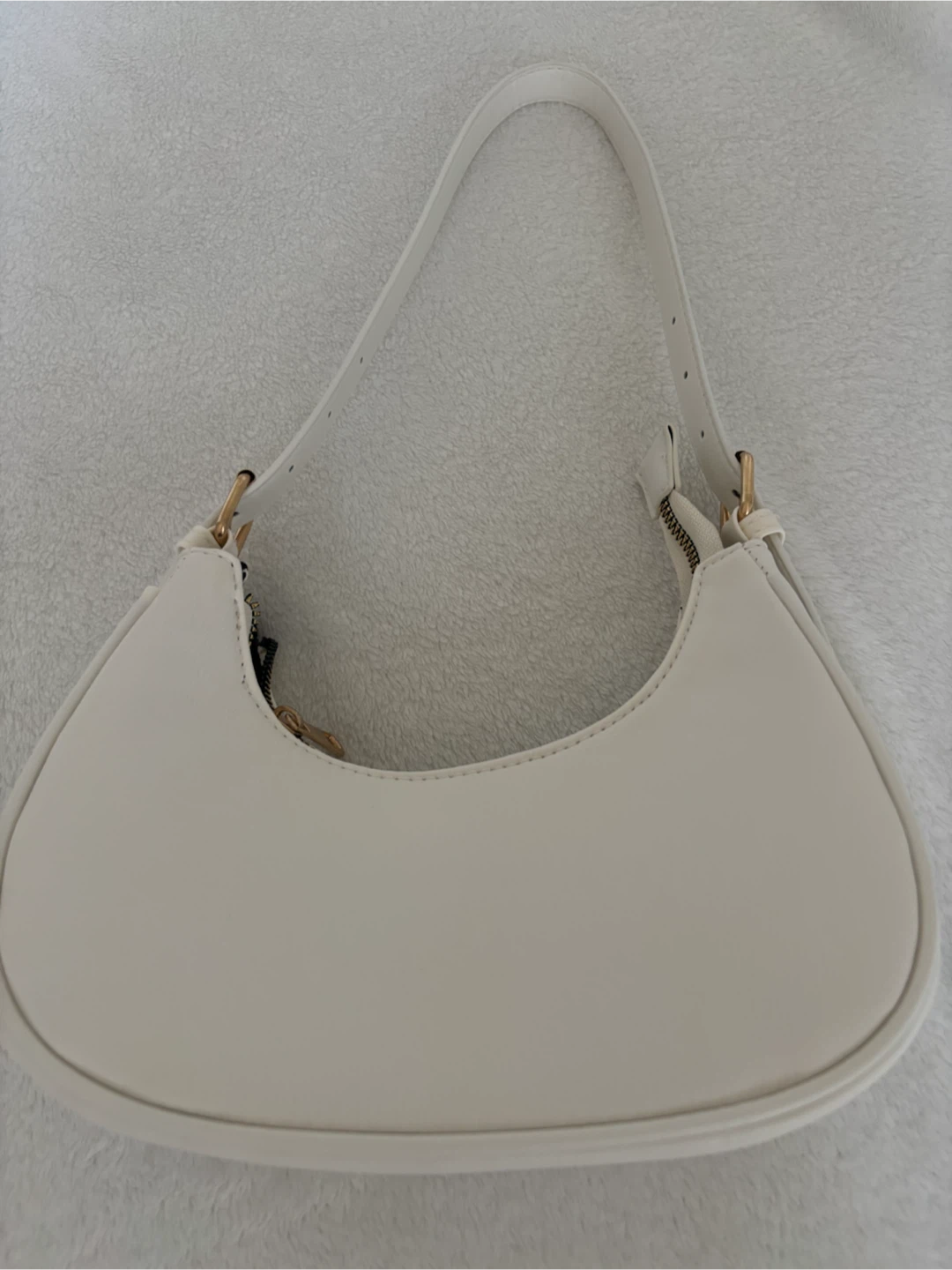 White crescent shoulder bag