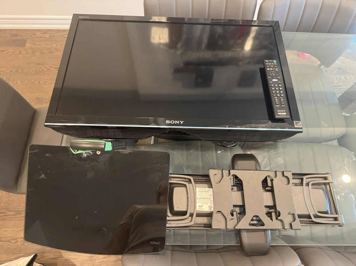 Sony BRAVIA TV with Wall Mount and Remote