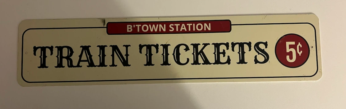 B'Town Station Train Tickets Sign
