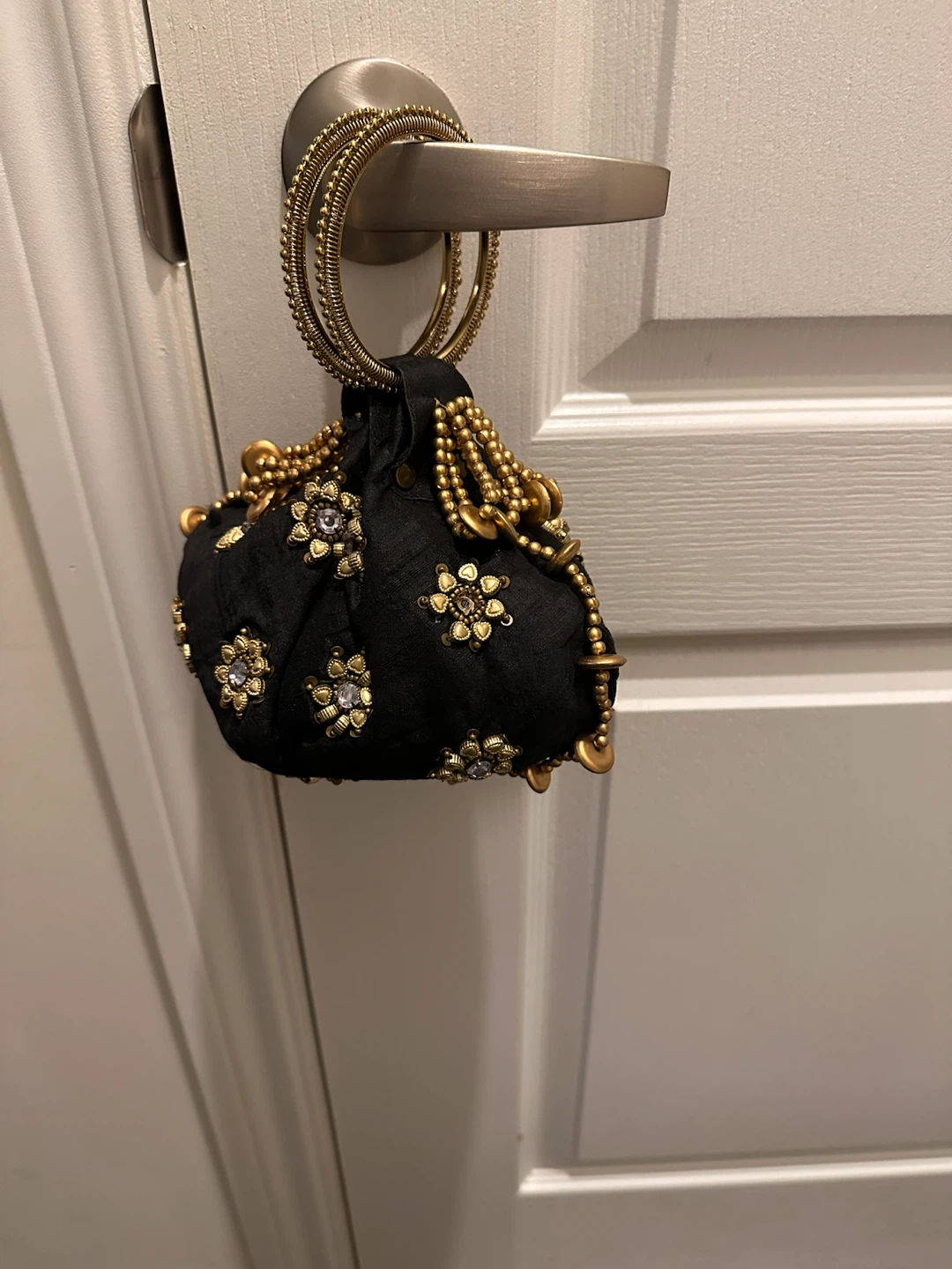 Embellished Black Clutch Bag with Gold Handle