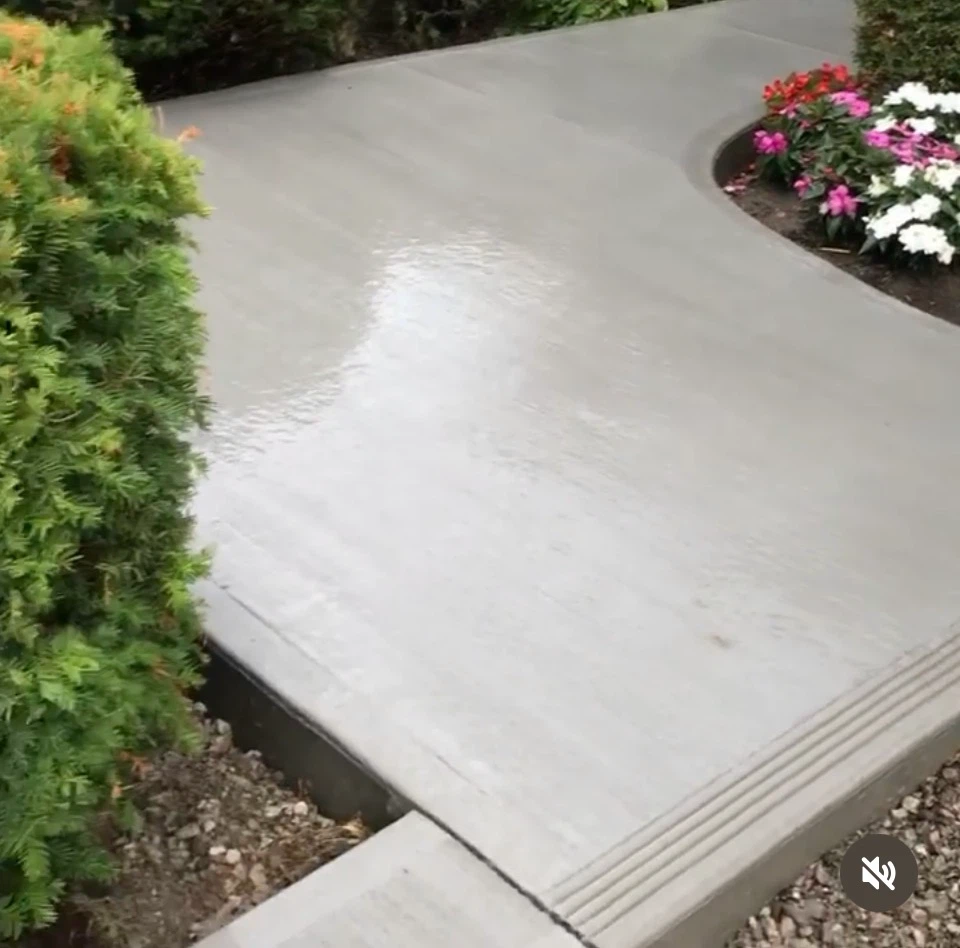 Concrete curb and walkway installation