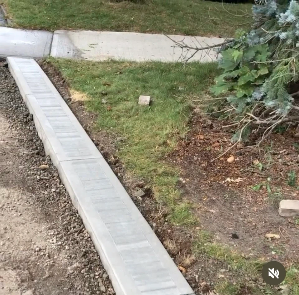 Concrete curb and walkway installation - photo 3