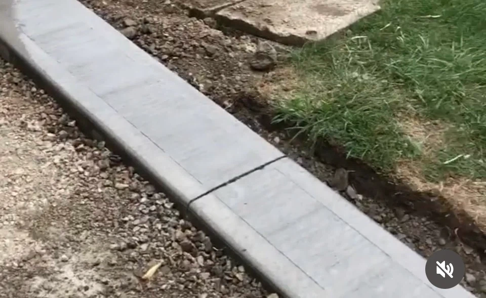 Concrete curb and walkway installation - photo 4