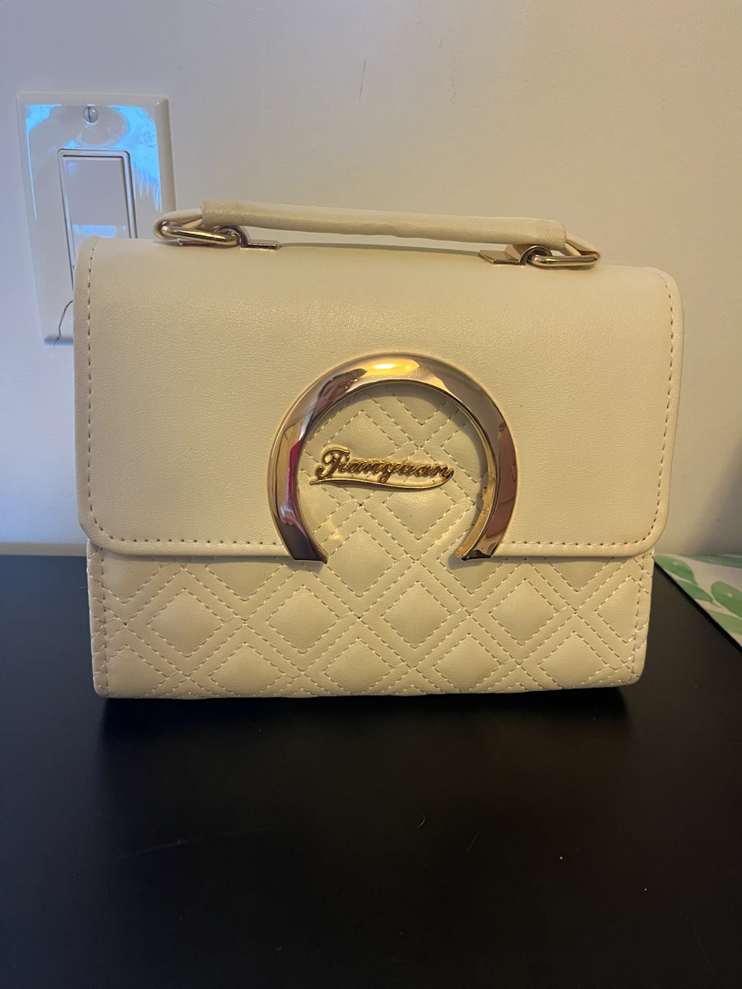 White Quilted Handbag with Gold Clasp