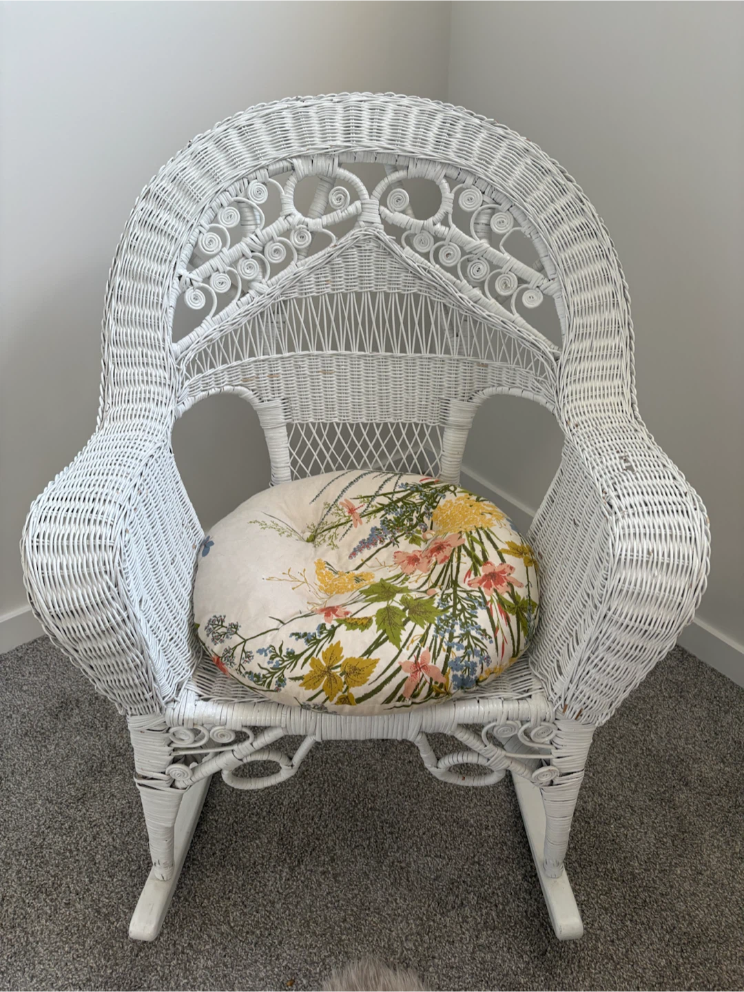 White Wicker Rocking Chair with Floral Cushion
