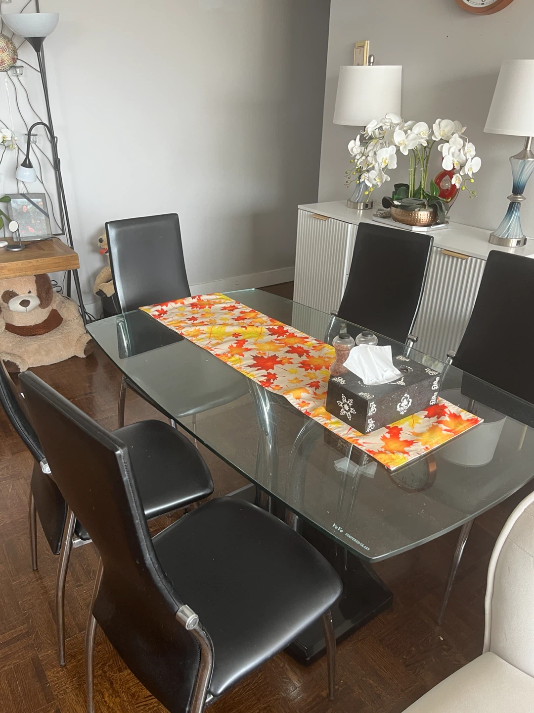 Glass Top Dining Table with Black Chairs
