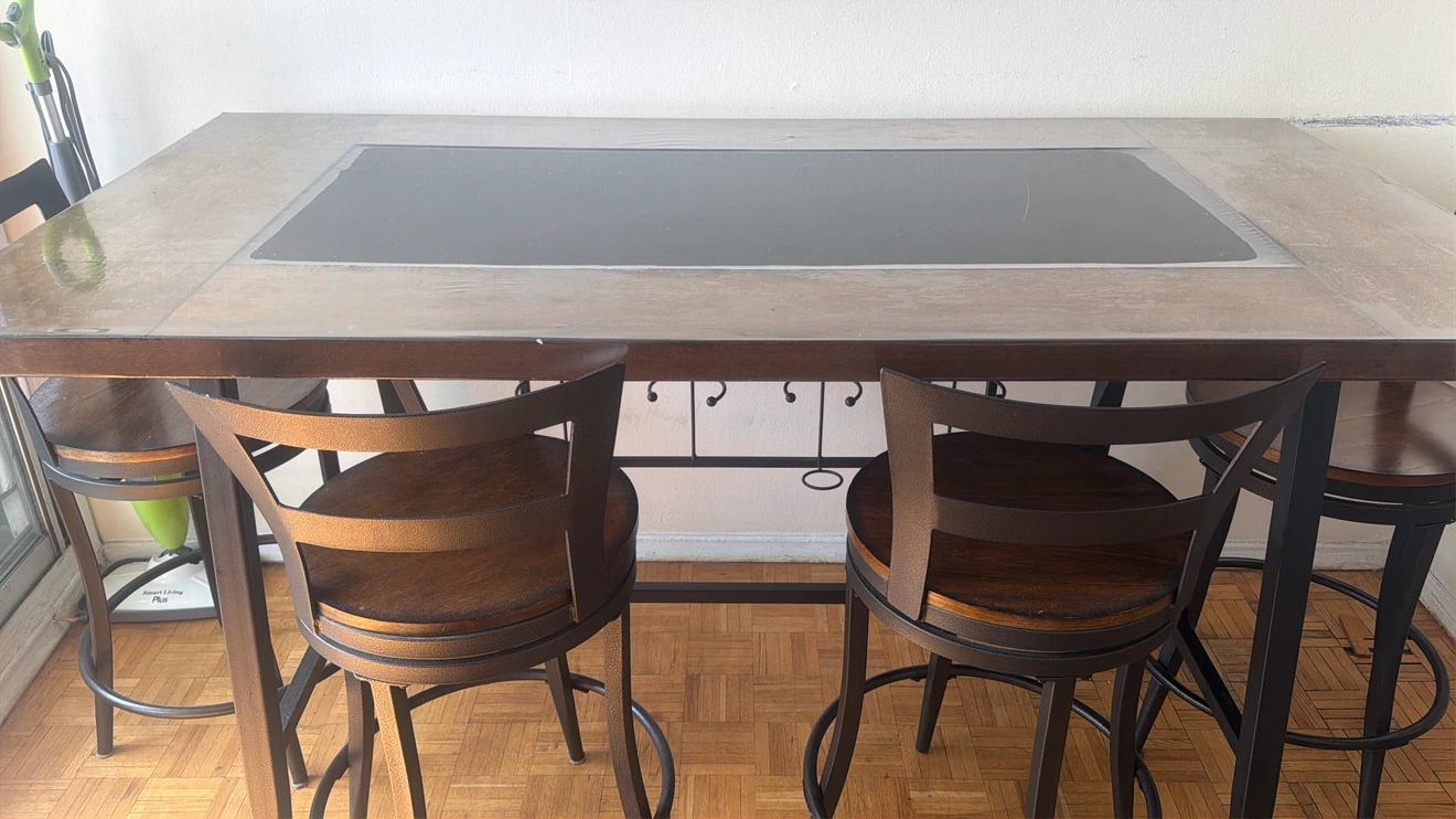 Bar height table with integrated wine glass rack