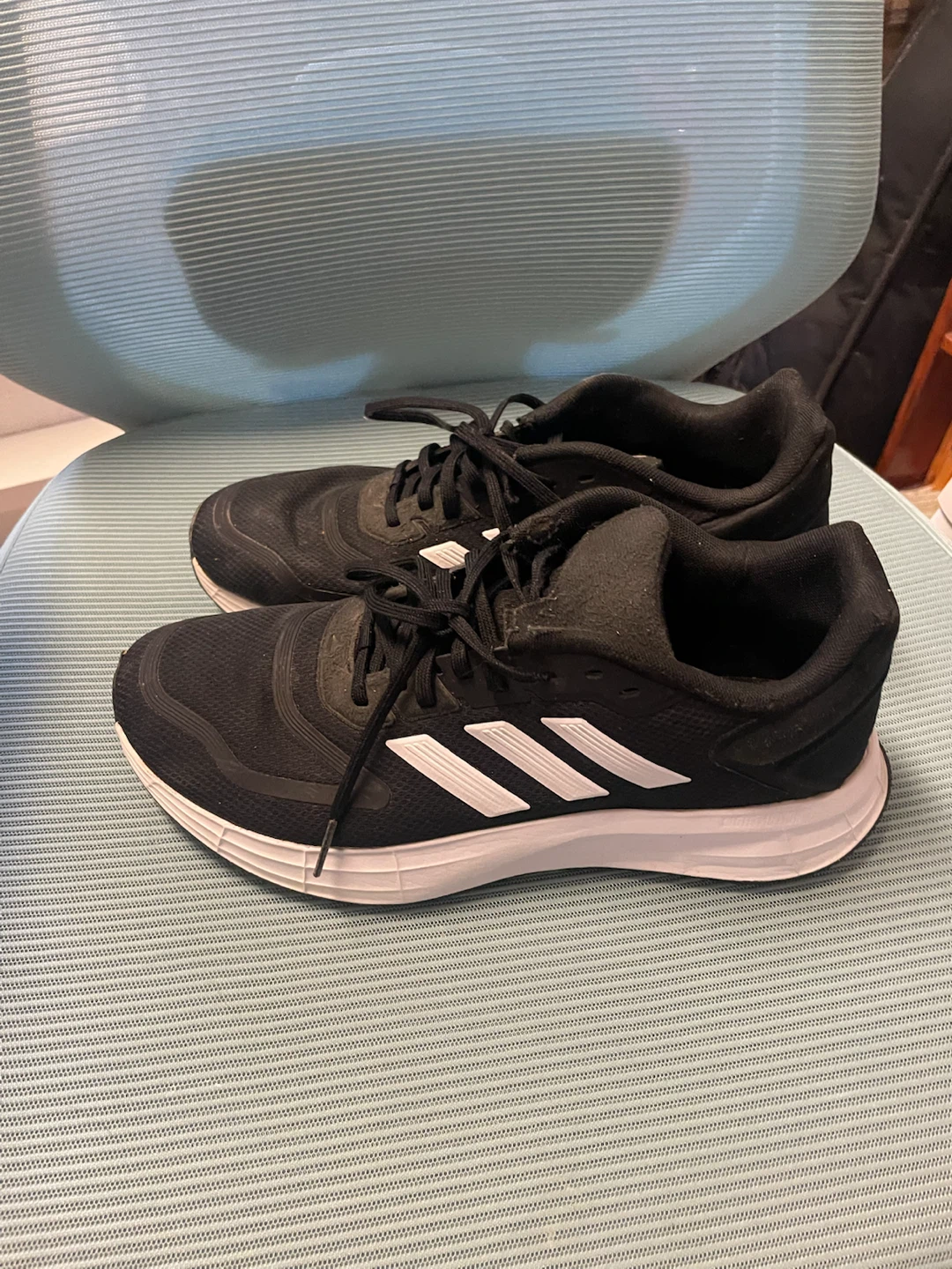 Black Adidas runners
