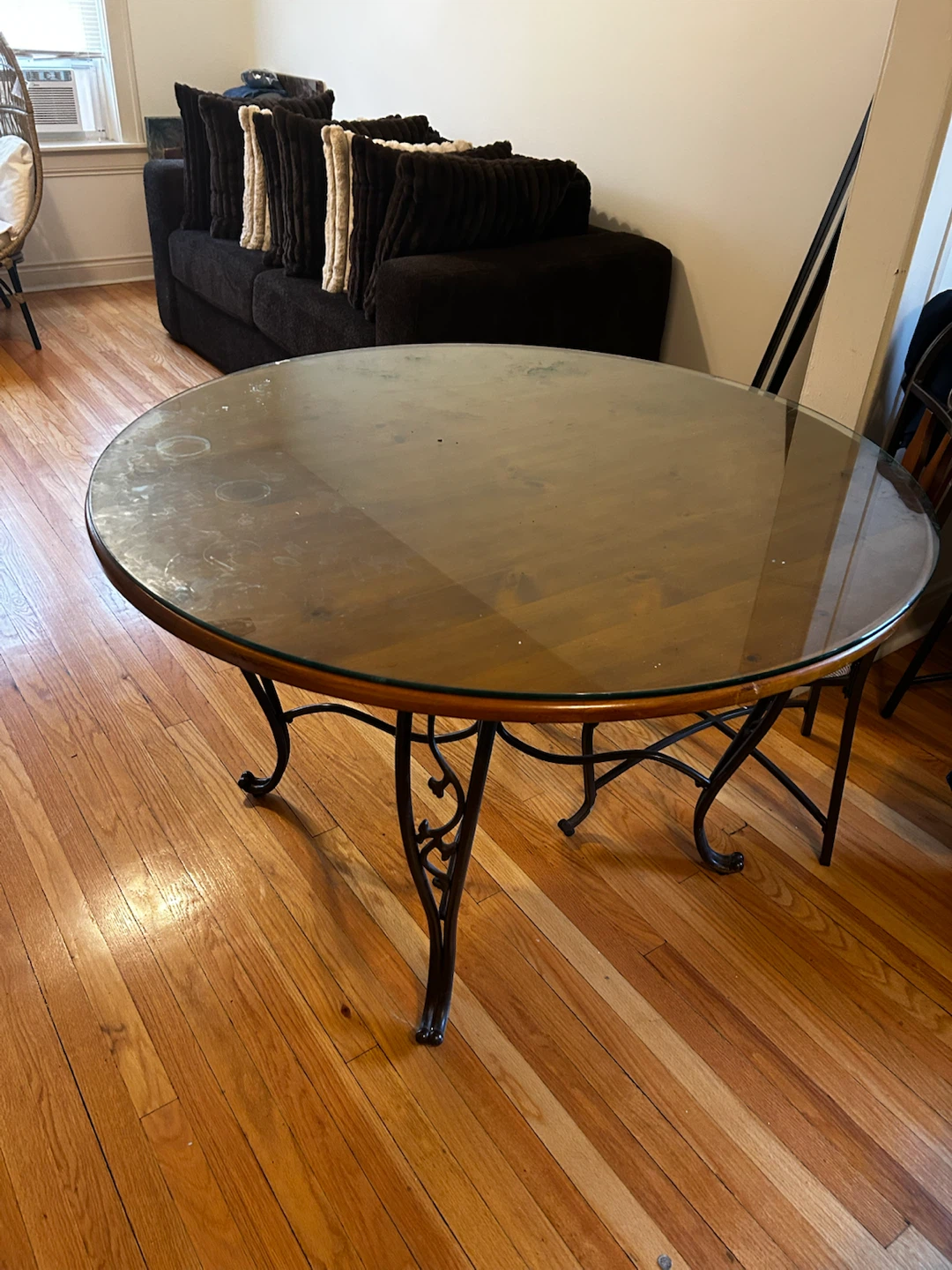 Round Glass Top Dining Table with Ornate Metal Base