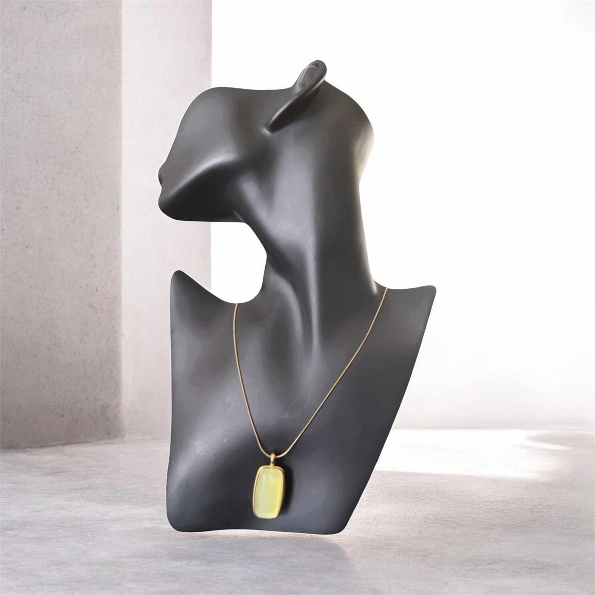 Gold tone necklace with a rectangular pale green pendant - photo 2