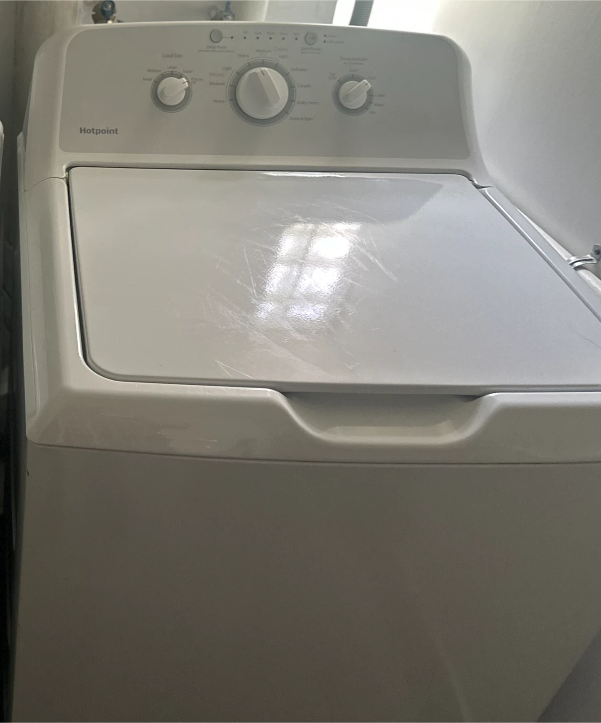 Hotpoint Top Load Washer and Front Load Dryer Set