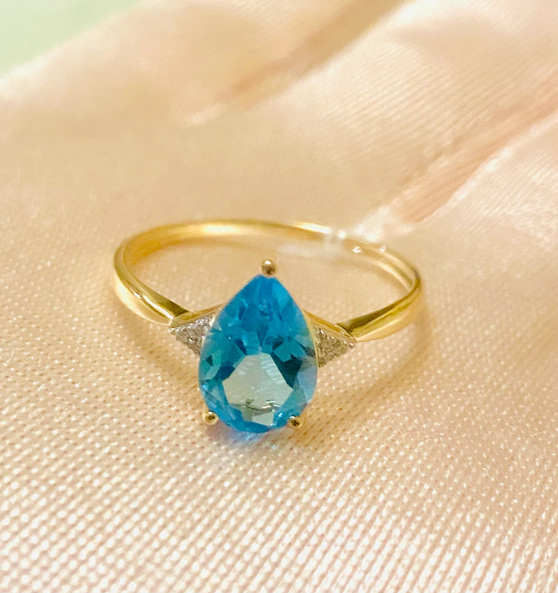 14K Gold Pear Blue Topaz Ring with Accent Diamonds