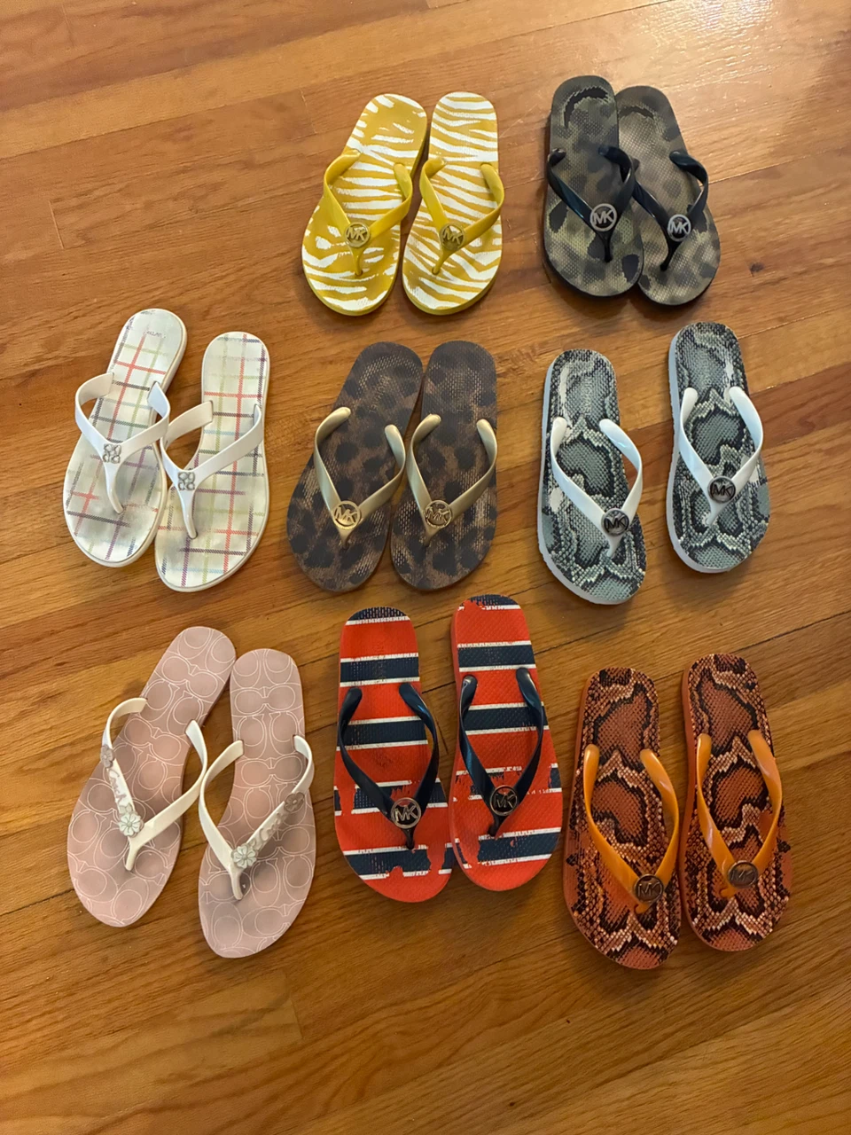 Michael kors flip flops authentic size 7 $5 each pair
