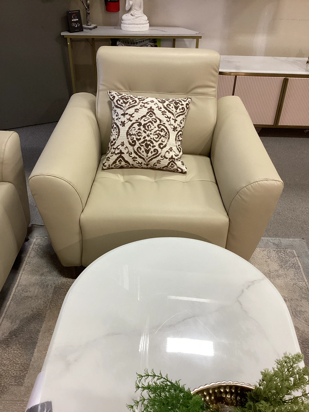 Cream Leather Armchair with Decorative Pillow