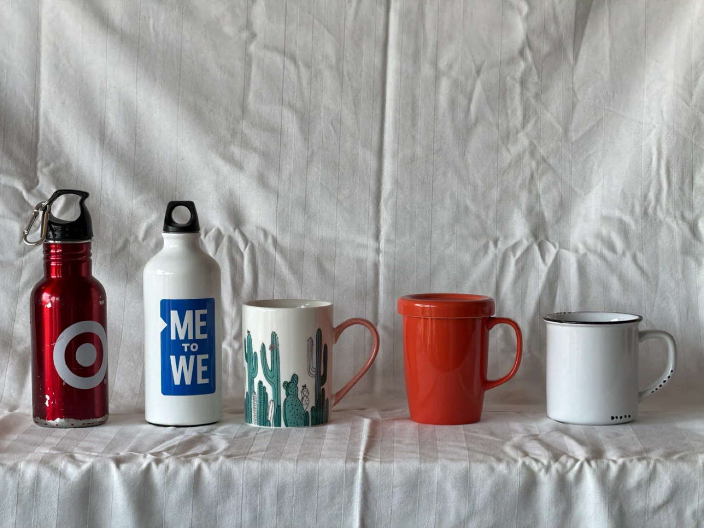 Lot of mugs and water bottles