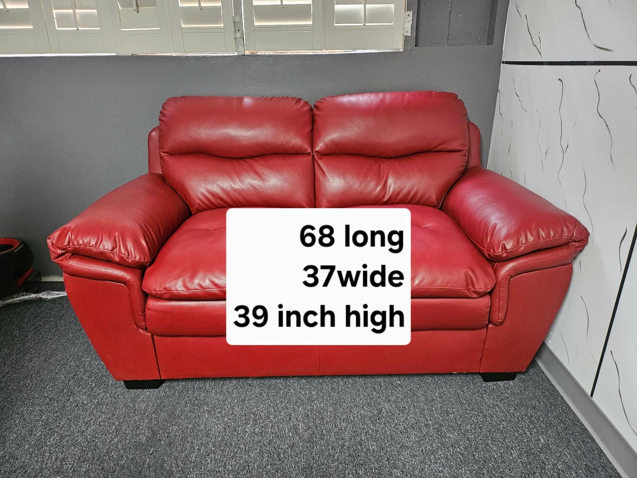 Red love seat leather