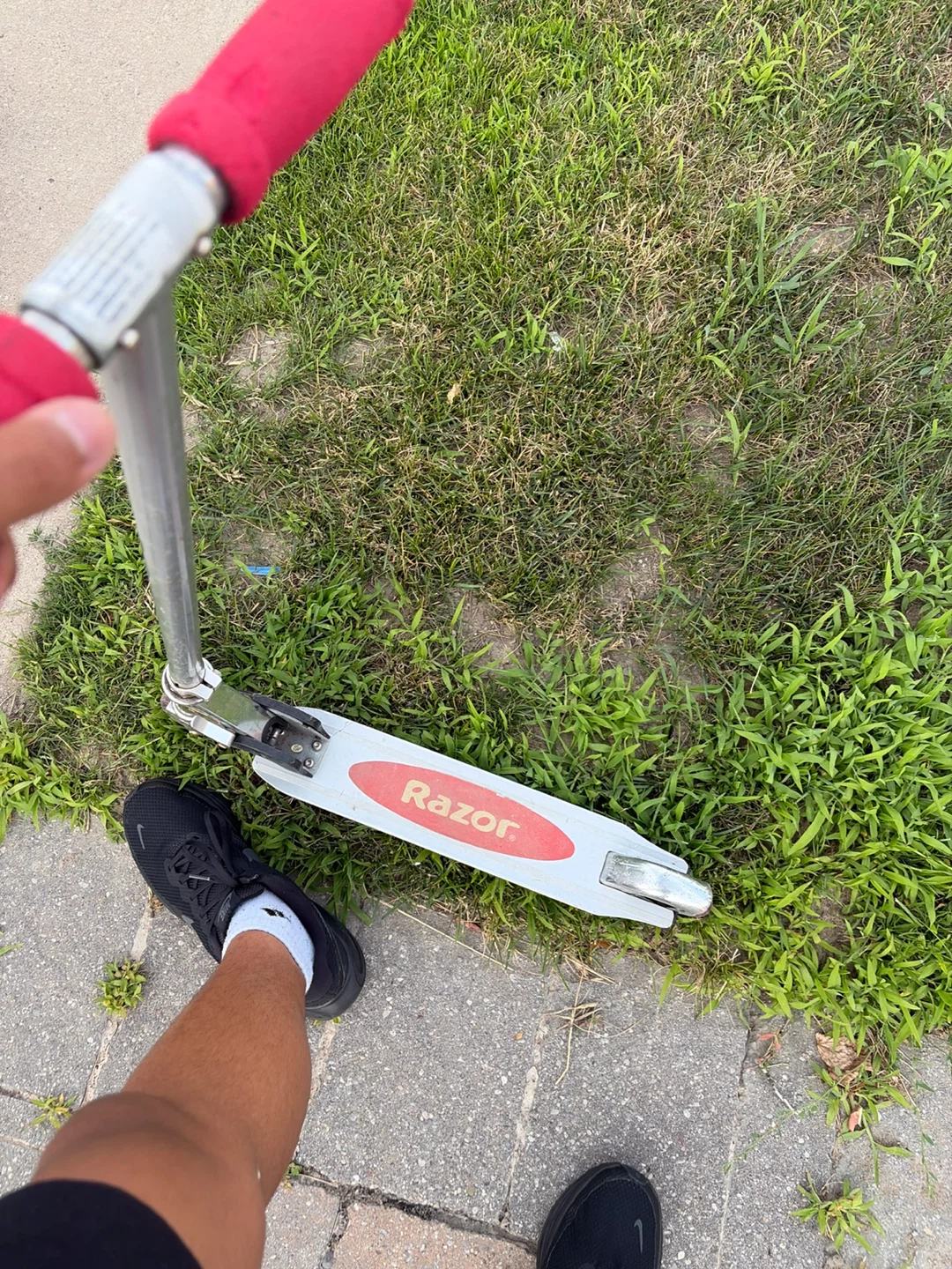 Razor Scooter with Red Grips