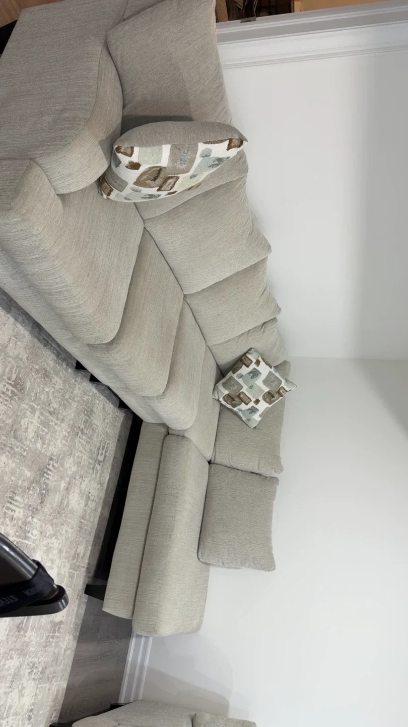 Light Beige Sectional Sofa with Accent Pillows
