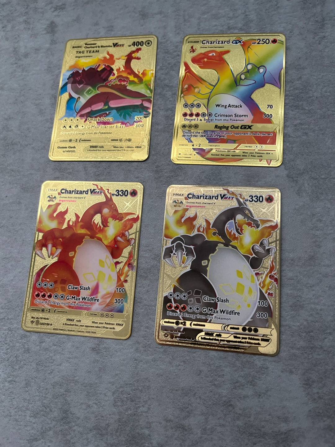 Set of 4 gold metal Pokémon cards