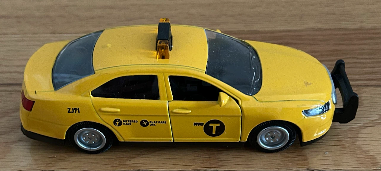Yellow NYC Taxi Toy Car