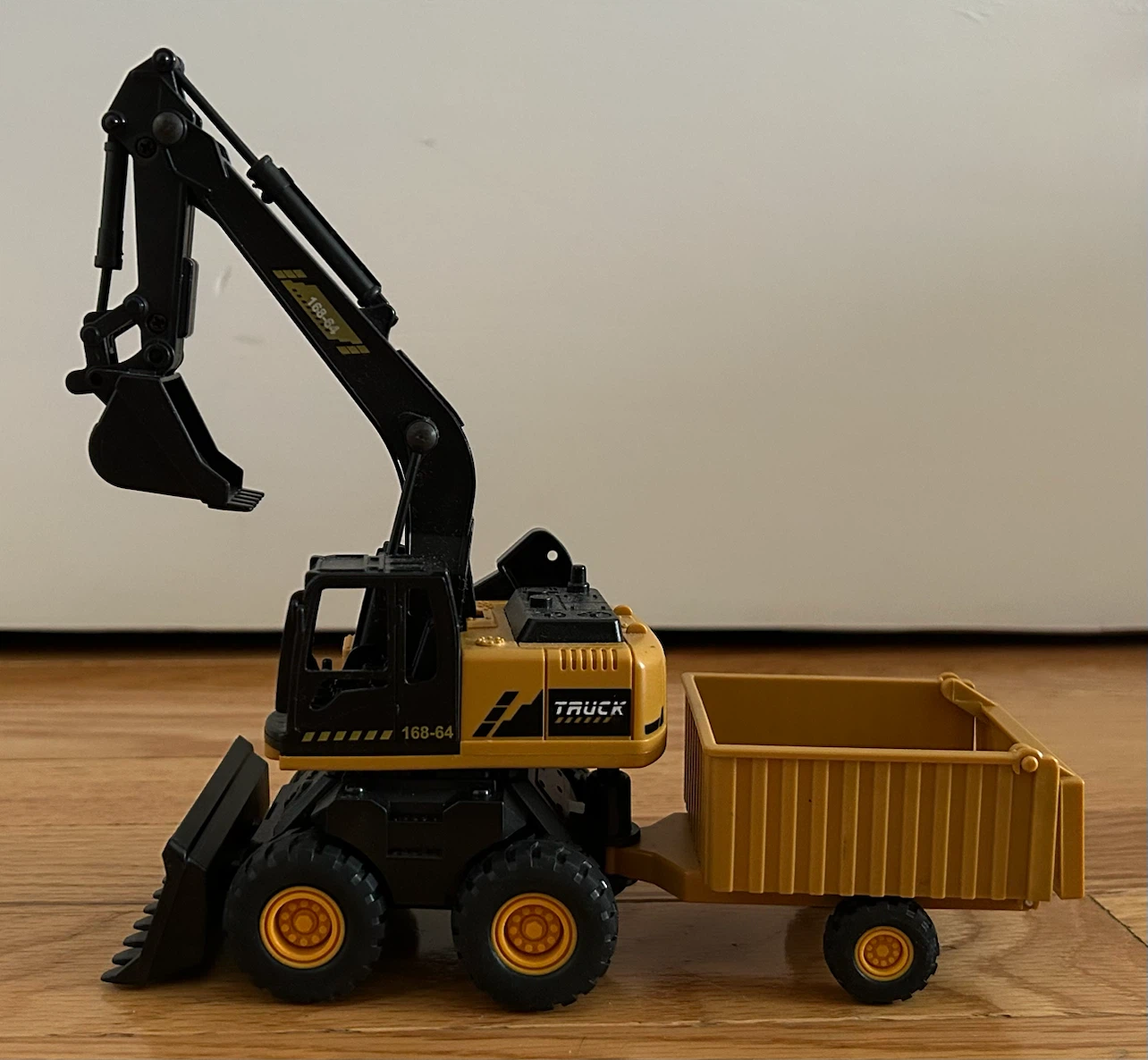 Yellow and Black Excavator Toy with Trailer