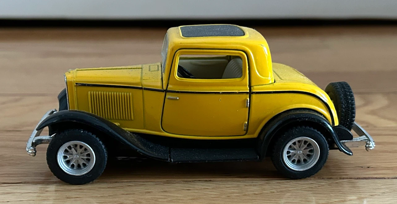 Yellow Diecast Coupe Toy Car