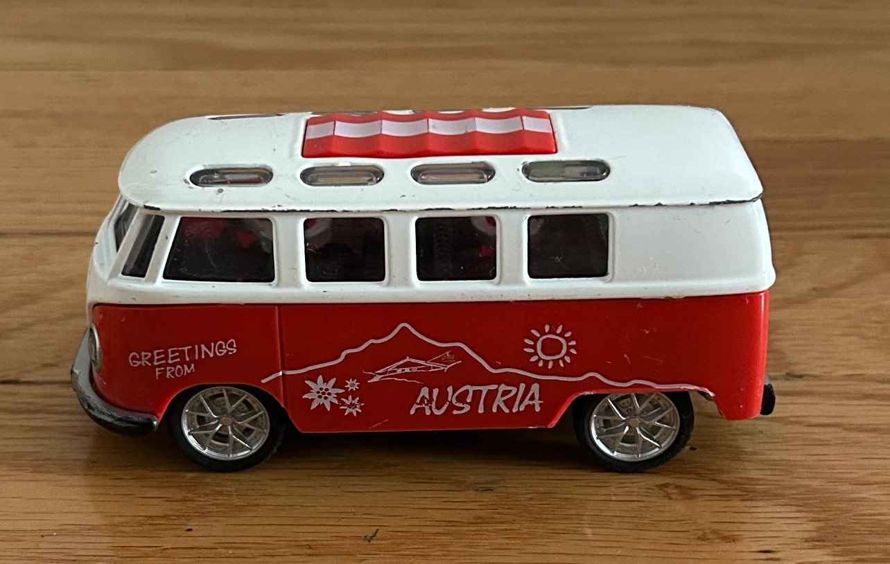 Red and White "Greetings from Austria" Diecast Bus