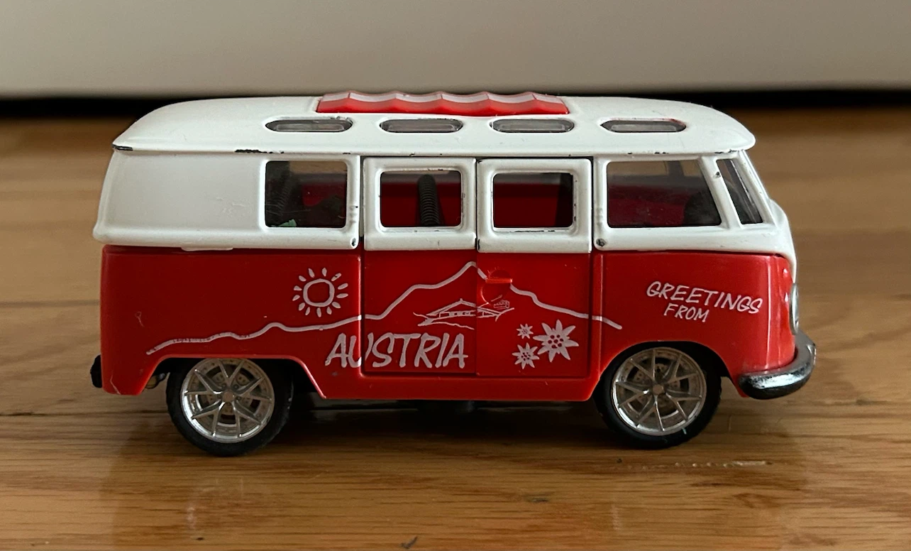 Red and White "Greetings from Austria" Diecast Bus - photo 3