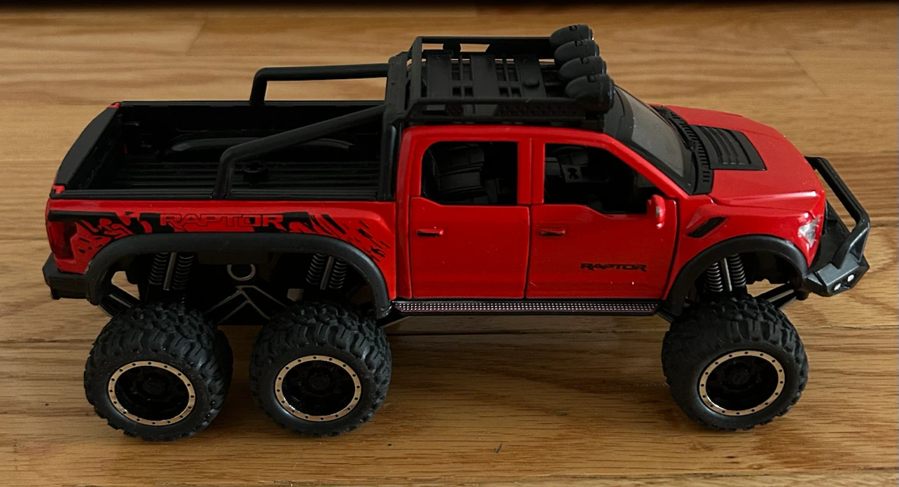 Red "Beast Raptor" Ford F-150 Toy Truck