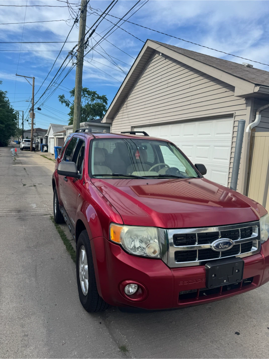 Red Ford Escape SUV - photo 2