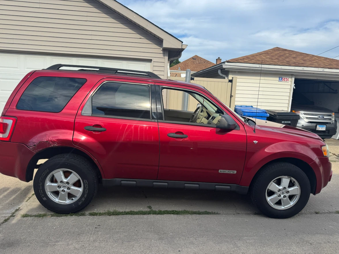 Red Ford Escape SUV - photo 3