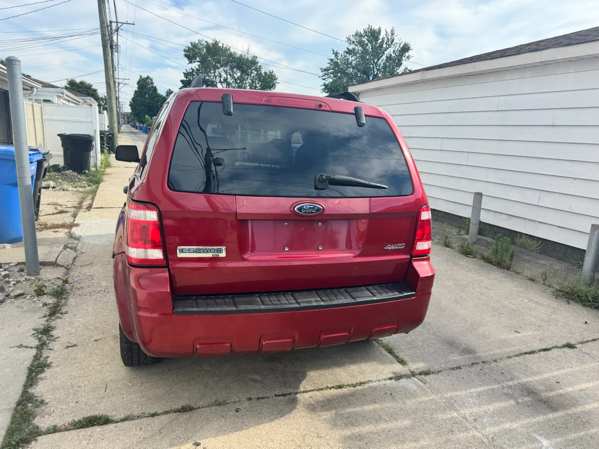 Red Ford Escape SUV - photo 4