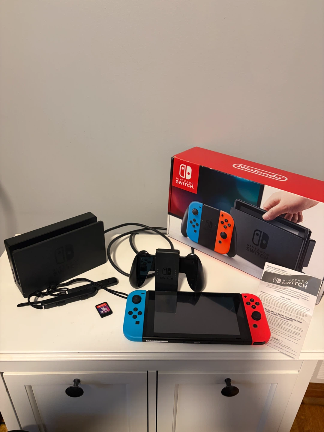 Nintendo Switch Console with Neon Blue and Red Joy-Cons