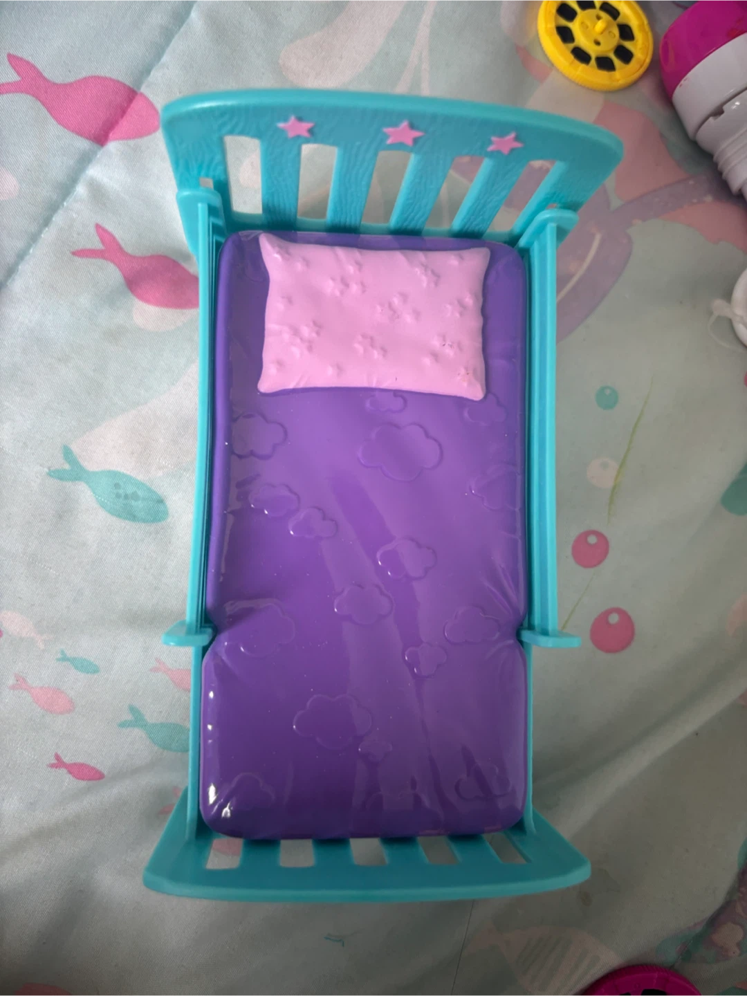 Little girl Barbie with a Barbie bed and a teenage girl Barbie