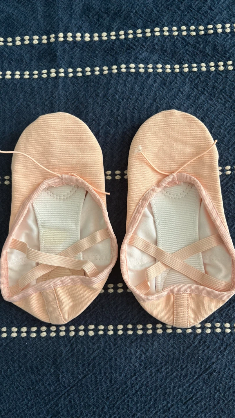 Ballet outfit: leotard, tutu, wrap top, and ballet slippers