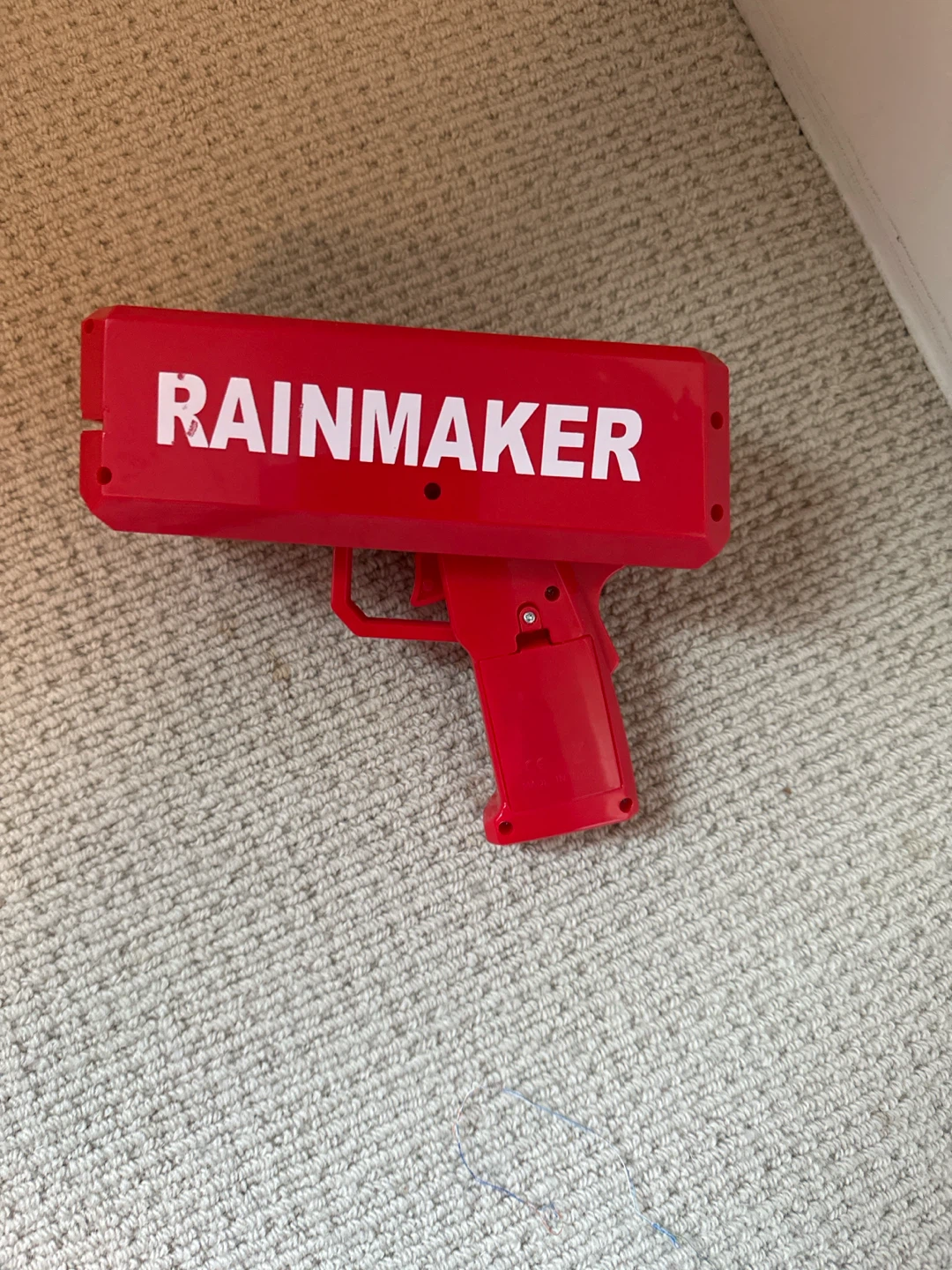 Red RAINMAKER toy gun