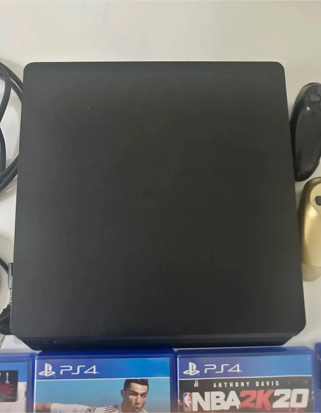 PlayStation 4 Slim 1TB Console with 4 Games