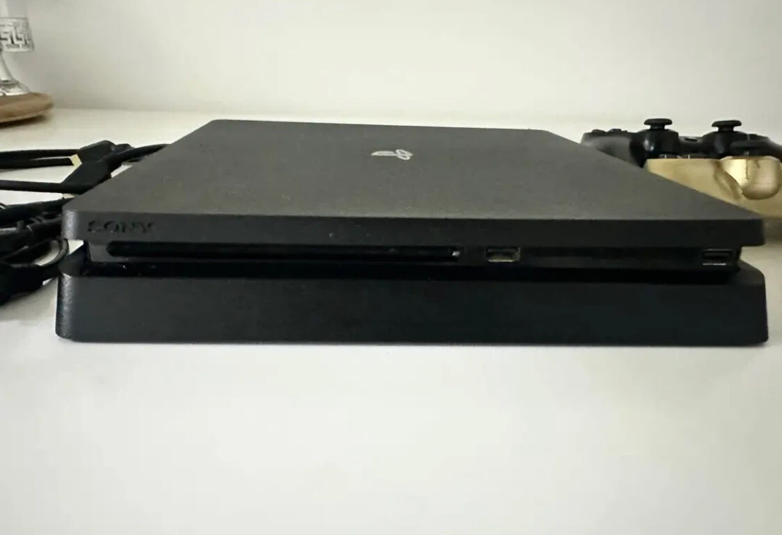 PlayStation 4 Slim 1TB Console with 4 Games - photo 2